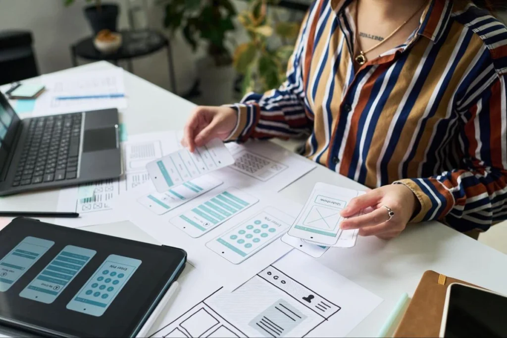 Custom Website Design Planning Session Web designer planning a custom website layout to replace a DIY business website